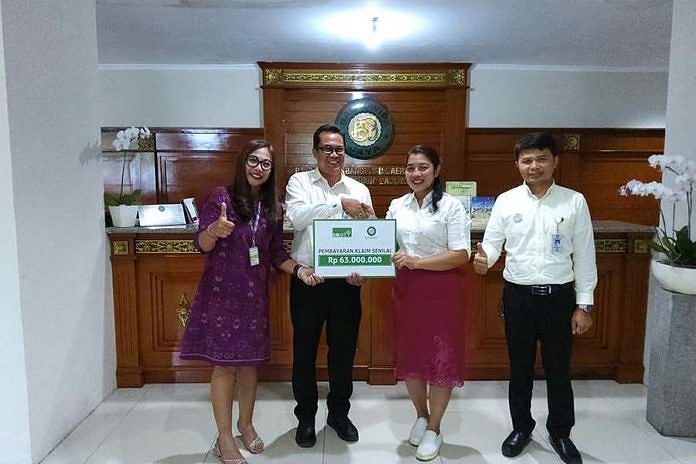 Equity Life Indonesia Serahkan Uang Santunan 1