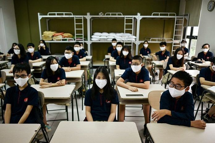 3 Bulan Diliburkan Karena COVID-19, Pelajar di Vietnam Kembali Sekolah 1