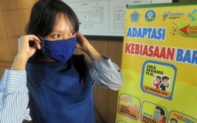 Pemerintah Terus Ingatkan Masyarakat Tetap Disiplin Masker 1