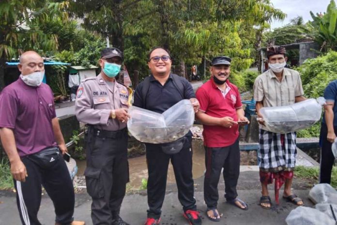 Jaga Kebersihan Sungai, Desa Medahan Tebar 10.000 Benih Ikan Nila 1