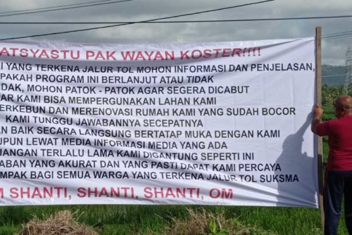 Warga Antosari Pasang Spanduk, Minta Kejelasan Lahan Terkena Proyek Tol Gilimanuk Mengwi 1