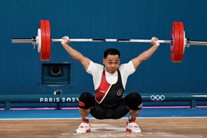 Lifter Eko Tetap Menjadi Pahlawan Meski Tanpa Medali 1