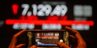 IHSG Ditutup Melemah 52,18 Poin