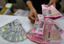 Kurs Rupiah Masih Melemah, Dipicu Ancaman Trump Lancarkan Aksi di Lebanon